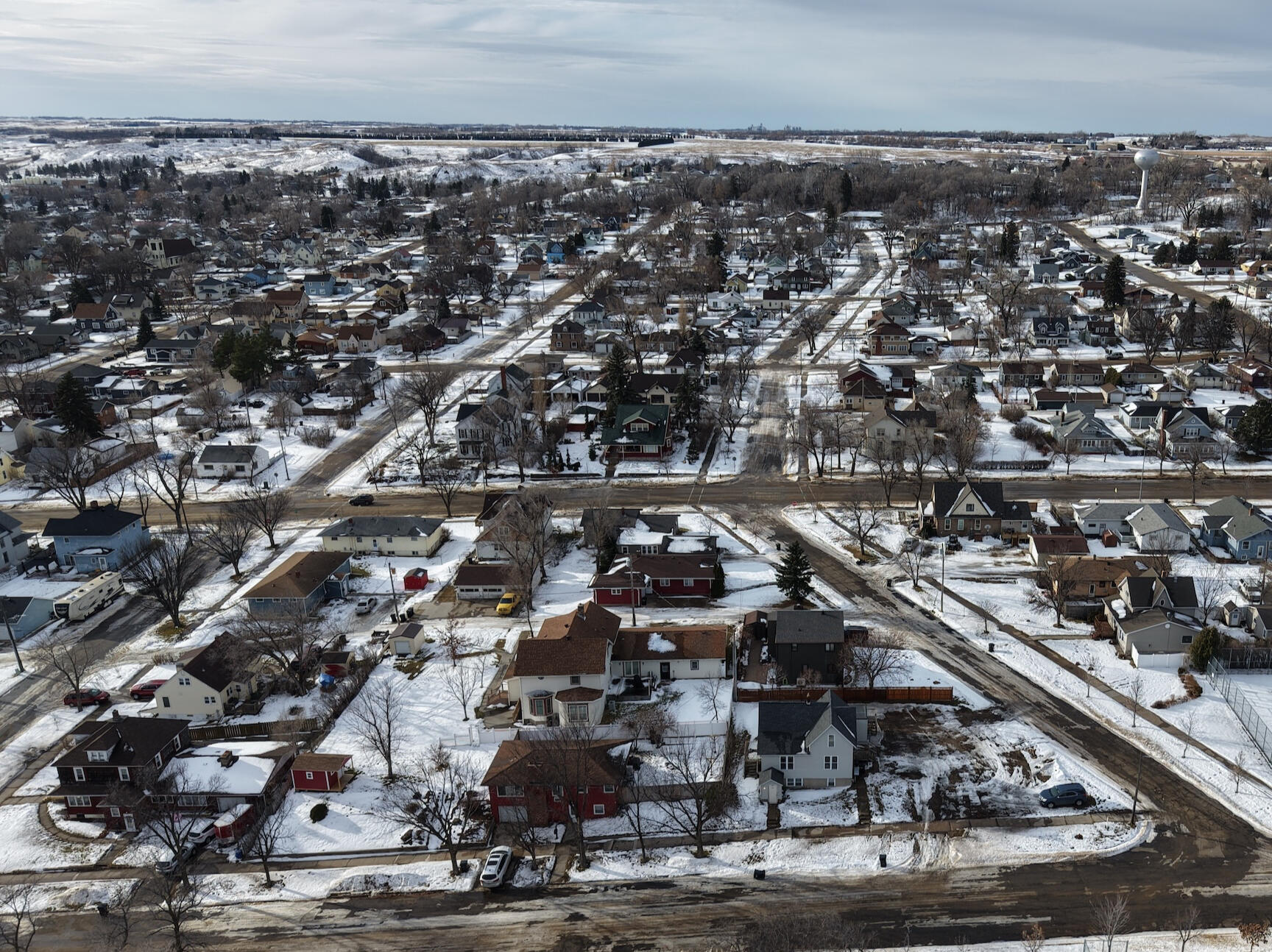 A picture of a snowy neighborhood.